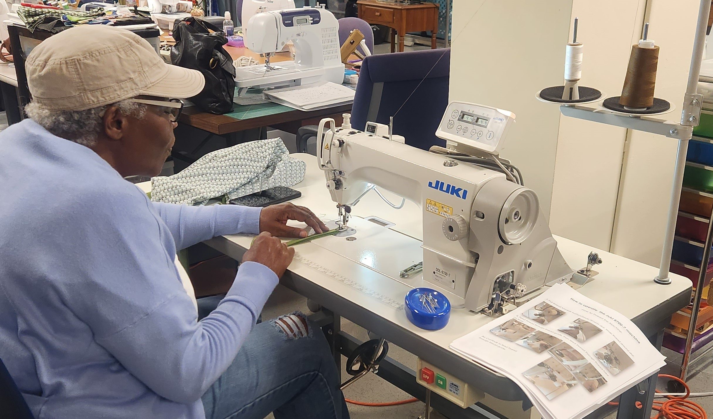 Industrial sewing machine in use